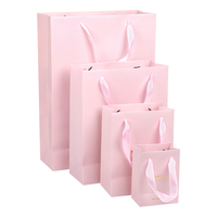 Sac à provisions en papier imprimé rose de boutique avec poignées en ruban emballage de vêtements sacs en papier avec logo personnalisé