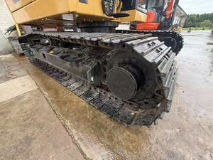 Excavatrice sur chenilles Caterpillar 310 d'occasion à faible nombre d'heures, système hydraulique stable et performant pour les travaux routiers, municipaux et agricoles. - Product Image 5