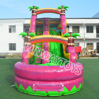 Toboggan aquatique gonflable de qualité commerciale avec piscine, motif palmier tropical, toboggan gonflable robuste pour location extérieure et événements.