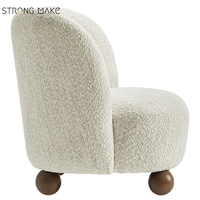 Fauteuil individuel de détente sur mesure en gros, chaise de salon luxueuse avec pieds en bois, style bouclé, pour hôtel et maison