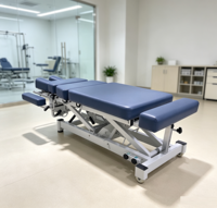 Table de massage électrique multifonction réglable avec fonction de descente et design ergonomique pour salon et usage hospitalier