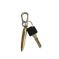 Un bolígrafo de grabado manual en forma de bala con anillo para colgar para grabar en metal