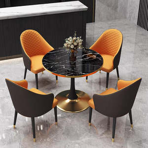 Juego <span class=keywords><strong>de</strong></span> Mesa <span class=keywords><strong>de</strong></span> Comedor Redonda <span class=keywords><strong>de</strong></span> <span class=keywords><strong>Piedra</strong></span> Sinterizada para 4 Personas con Estructura <span class=keywords><strong>de</strong></span> Metal Dorado Estable y Sillas <span class=keywords><strong>de</strong></span> Cuero PU para Uso en el Hogar y Cafeterías - Product Image 1