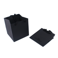 Couvercle et base en carton de logo de luxe noir pour pot de miel et boîte d'emballage cadeau de bouteille avec insertion d'éponge et sac à main