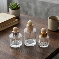 Bouteilles diffuseurs à roseaux en verre transparent de 50 ml en gros avec bouchons en bois, surface givrée, imprimées, vides, pour huiles essentielles, parfums et décoration intérieure