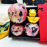 Vente en gros de sphères de cristal de rhodonite rose et noire polies naturelles pour la guérison, la décoration et les cadeaux