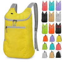 Mochila Plegable de Nailon Ripstop con Logotipo Personalizado OEM ODM, con Puerto para Auriculares y Bolsa con Cordón para Viajes y Montañismo
