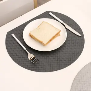 Toptan özel düzensiz şekil yumuşak lüks yıkanabilir yemek masası paspaslar restoran için PU deri Placemat Set