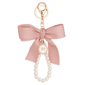 Portachiavi con perla di moda regalo personalizzato con Logo di lusso con Bowknot squisito regalo per la festa della mamma