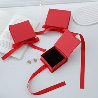 Boîte cadeau en carton noir en forme de livre avec mousse noire pour boucles d'oreilles pendantes, bracelets, breloques et clous d'oreilles en alliage personnalisés, coloris noir, blanc, café foncé, marron