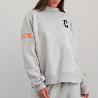 Sweat-shirt décontracté pour femme à col montant, coupe oversize, épaules tombantes, style universitaire, avec logo sur la poitrine et motif graphique sur les manches, par un fabricant de vêtements