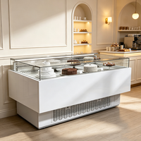 Vitrine à pâtisserie en verre trempé de la série MUSE de Carrier Custom Factory avec dégivrage automatique pour les cafés, boulangeries et pâtisseries commerciales en intérieur