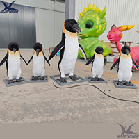 Statue d'animal animée grandeur nature véritable pingouin animatronique pour la décoration de parc animalier océanique