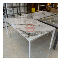 Ensemble de table à manger 8 places en aluminium antique de style moderne simple et stable avec grand espace et table à manger en marbre noir