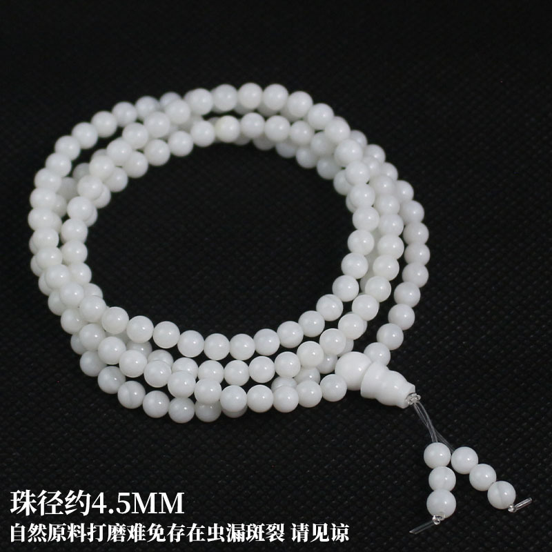 Porcelain white, 4.5mm, approximately 145 beads