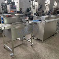 Machine automatique de fabrication de chocolat HNOC Machine d'enrobage de chocolat avec tunnel de refroidissement à vendre