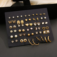 À la mode perle papillon et marguerite Tai Chi mode boucles d'oreilles luxe plaqué or Zircon pierres pour les femmes âgées doux Cool en gros