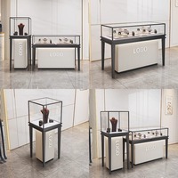 Vitrine à bijoux en or de luxe, design circulaire personnalisé, vitrine à bijoux en verre verrouillable