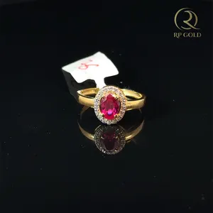 Elegant 24K <b>Gold</b> <b>Ring</b> Oval Red Stone Sparkling Halo Design Luxury Jewelry Piece for Women Daily Wear Wedding Special Occasion - Product Image 1