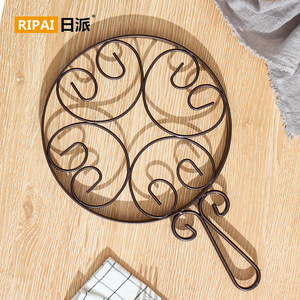 Support de casserole en fer Ripai avec poignée, coussin isolant thermique, dessous de plat anti-brûlure, utilisation domestique en cuisine - Product Image 1