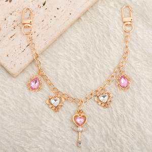 Nouvelle conception de chaîne de <span class=keywords><strong>sac</strong></span> <span class=keywords><strong>baguette</strong></span> magique vintage en or rose <span class=keywords><strong>avec</strong></span> cristal cœur rose, breloque de décoration de <span class=keywords><strong>sac</strong></span> à main tendance pour femmes - Product Image 3