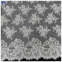 Tissu en dentelle blanche élégante YX713 en gros, motifs floraux délicats, tissu en dentelle à franges pour jupe et nappe