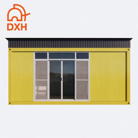 Maison conteneur préfabriquée moderne personnalisable de 220 pieds avec toit incliné, structure en acier durable et panneaux sandwich isolants pour écoles et centres commerciaux