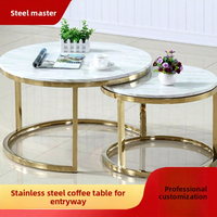 Table basse ronde pliable en acier inoxydable de style nordique moderne et luxueux avec plateau en marbre pour le salon