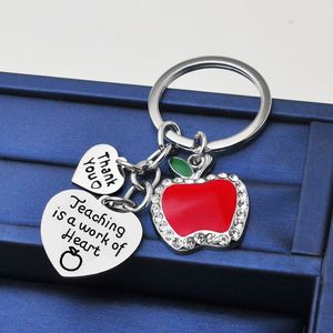 Dạy học là một công việc của trá<span class=keywords><strong>i</strong></span> tim Keychain trở lạ<span class=keywords><strong>i</strong></span> trường học quà tặng cho giáo viên móc chìa khóa kim loạ<span class=keywords><strong>i</strong></span> quà tặng ngày của giáo viên đánh giá cao giáo viên - Product Image 4