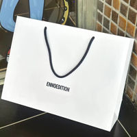 Maßgefertigte Umweltfreundliche Luxus-Papiertüte mit UV-Logo-Laminierung aus Recyclingmaterialien für Boutique-Verpackungen