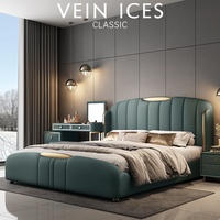 Lit double en bois massif de luxe léger en cuir de luxe Ensemble de meubles de chambre à coucher avec dossier rembourré