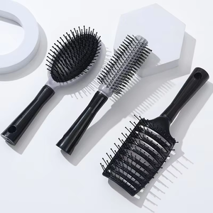 Cepillo Desenredante Portátil Personalizado al por Mayor con Ventilación Curva Antiestática y Masaje para el Cuero Cabelludo, con Logotipo, para Todo Tipo de Cabello - Product Image 1