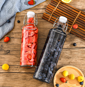 Bouteille en verre transparent de 1000ml avec <span class=keywords><strong>bouchon</strong></span> en céramique et couvercle à clip pivotant 32oz Verre à jus de vin Bouteille d'eau en verre de 600ml pour usage alimentaire - Product Image 5