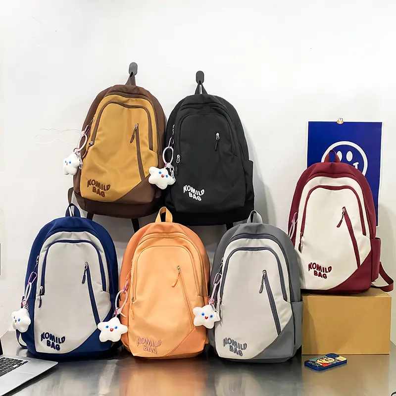 Last reduzierende Schult asche Koreanische Version Kontrast farbe mit großer Kapazität Kleiner frischer Rucksack Neuer Junior-Schüler