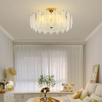 Lustre contemporain créatif en acier inoxydable et verre avec design plume, luminaire de plafond pour la décoration de la maison, idéal pour le salon