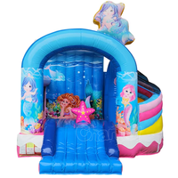 Parc de jeux gonflable à thème indigène Tiki Land avec toboggan, château gonflable, combo de château sauteur et moonwalk