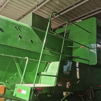 Moissonneuse-batteuse à roues multi-cultures John Deere C230 d'occasion haute performance 201 CV excellent état faible consommation pour maïs, blé, riz