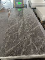 Panel de Mármol Negro Dorado con Patrones de Vetas Doradas Fluidas para Instalación en Paredes Decorativas
