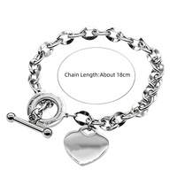 Bracelet à breloques en forme de cœur en acier inoxydable pour femmes - Bracelet à chaîne avec fermoir à bascule OT de couleur argentée