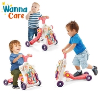 Vente en gros de jouets pour bébés marchette à pousser table d'apprentissage éducatif précoce poussette musicale pour tout-petits avec roues et siège pour bébés