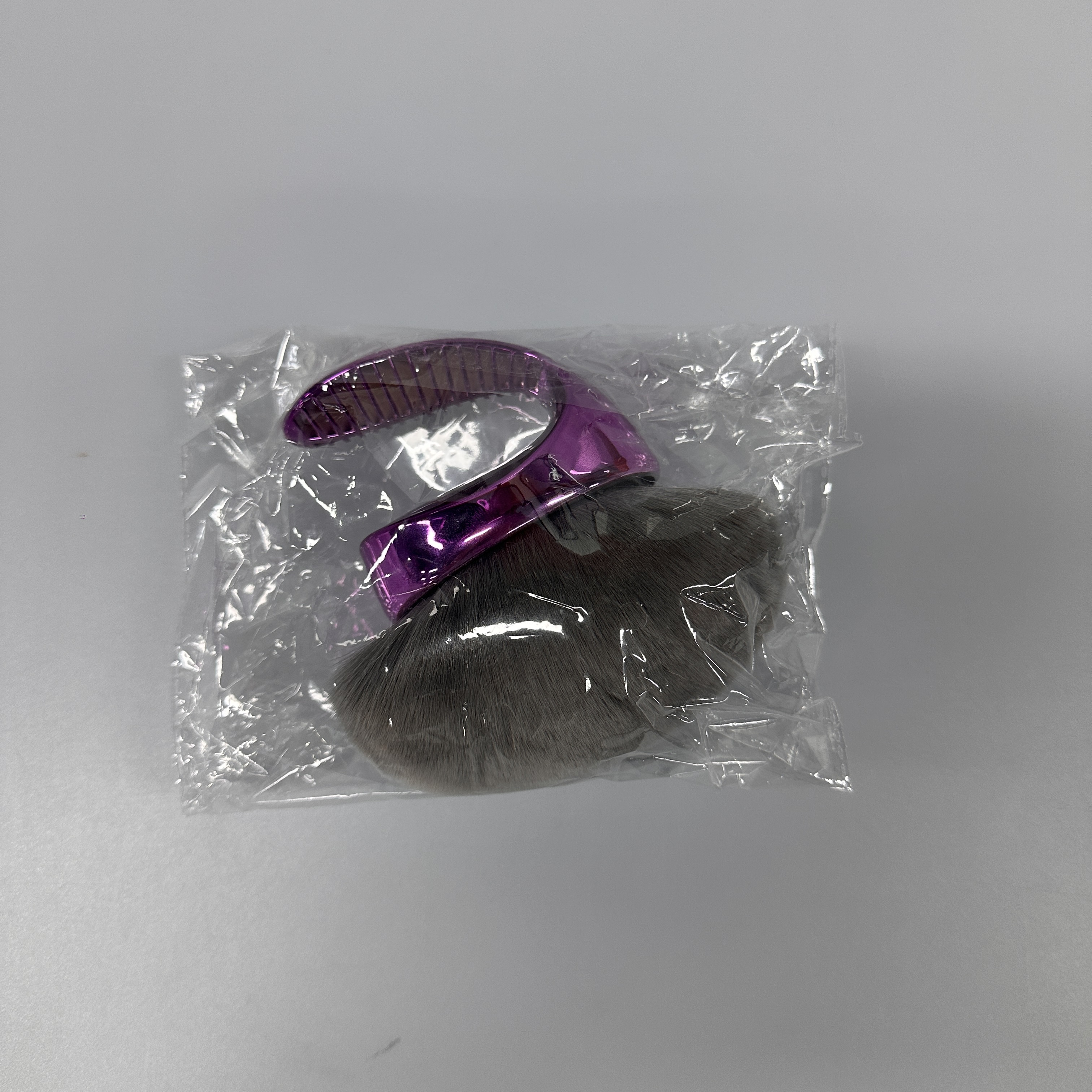 Poignée violette (sac opp)