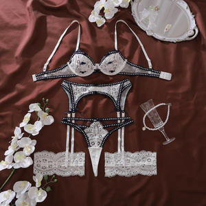 Conjuntos de lencería erótica de encaje hueco para mujer, conjuntos de lencería íntima, conjuntos de lencería con cinturón de liguero, sujetador y bragas blancos al por mayor - Product Image 6