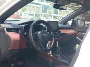 Toyota <span class=keywords><strong>Corolla</strong></span> <span class=keywords><strong>Cross</strong></span> SUV I4 1.8L Hybride, Toit Panoramique, Sièges en Cuir, Pneus R17, Traction Avant, Boîte Automatique, Toit en Alliage d'Aluminium, Occasion - Product Image 4