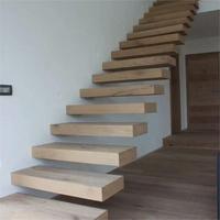 Escaliers flottants au design minimaliste moderne avec structure en acier et fer Bandes de roulement en bois massif Tailles personnalisées