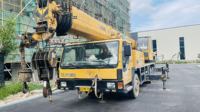Grue de camion d'occasion 25t montée sur véhicule, excellente performance de conduite, palier d'orientation robuste