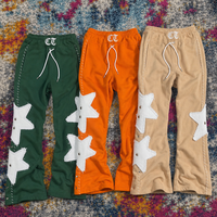 Ensemble deux pièces homme personnalisé avec applique étoile, sweat à capuche zippé respirant délavé à l'acide et pantalon de survêtement droit, style streetwear assorti