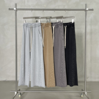 Pantalon de survêtement large en coton pur 380 GSM, teint à la cire, effet vieilli, bords effilochés, patchwork, drapé, avec logo personnalisé