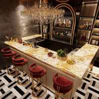 Comptoir de bar haut de gamme avec panneau rayé doré, dessus en marbre éclairé par LED, station de bar pour les établissements hôteliers de luxe