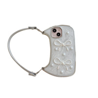 Pochette en gel adhésif - Fond blanc avec deux nœuds, conçue comme une sangle pour les coques d'iPhone 15