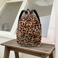 Mini sacs à dos d'hiver en caoutchouc PU avec logo personnalisé pour femmes grands sacs à dos léopard à motif animal pour hommes sacs à dos léopard de voyage en fausse fourrure